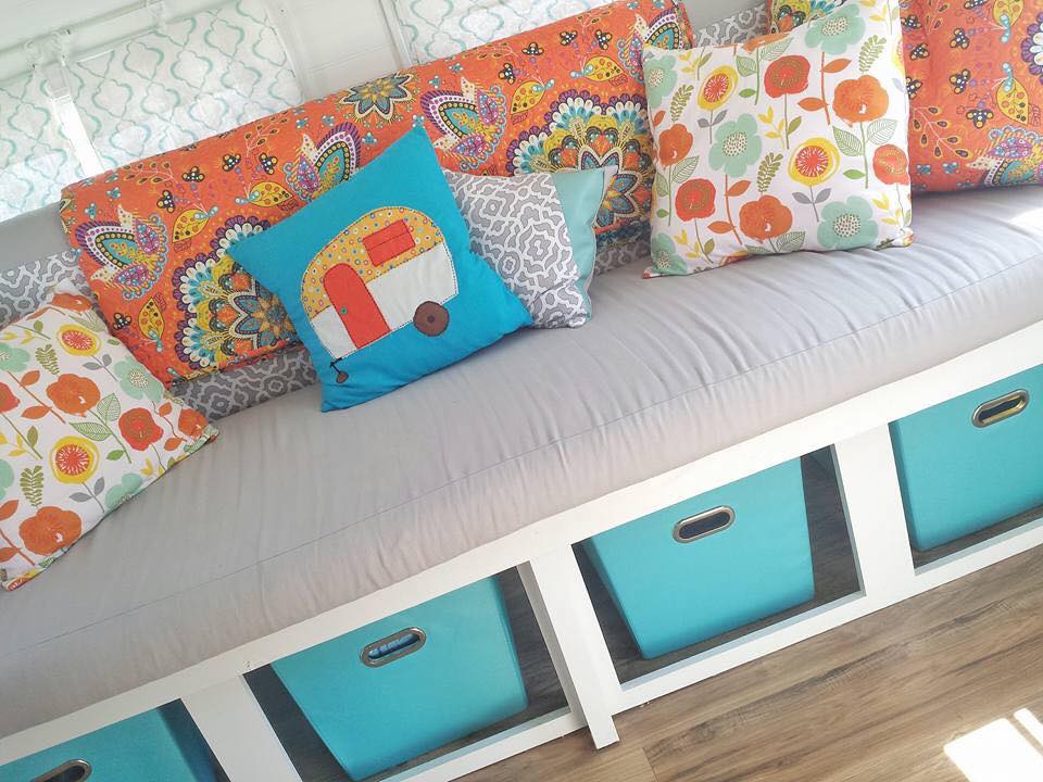 orange and teal vintage trailer